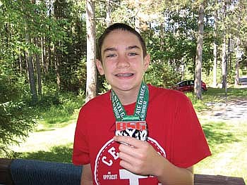 Photo: Local bowler medals at state games
