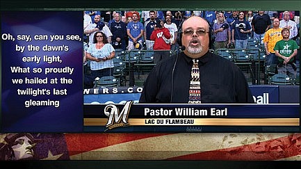 Lac du Flambeau church pastor  sings for Miller Park crowd