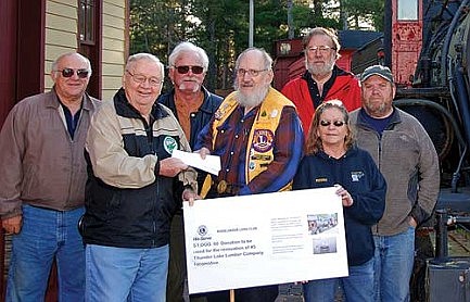 Rhinelander Lions contribute to restoration of locomotive
