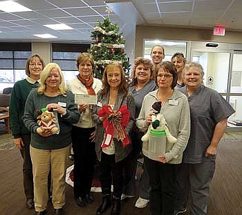 Rhinelander Dental Center donates pocket penny drive funds to NATH Adds to annual Marshfield Clinic donation of $750 for homeless shelter
