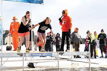 Brrr! Jumpers brave frigid temperatures at Three Lakes polar plunge
