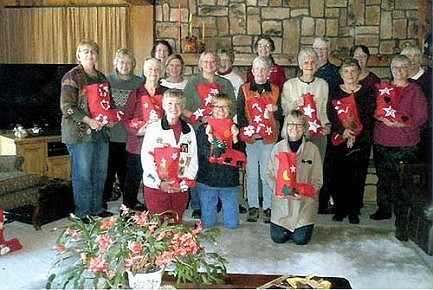 Newcomers group completes stockings for soldier project
