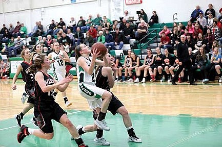 Lady Hodags fade late against Medford