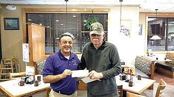 Friendship House donates to AMVETS