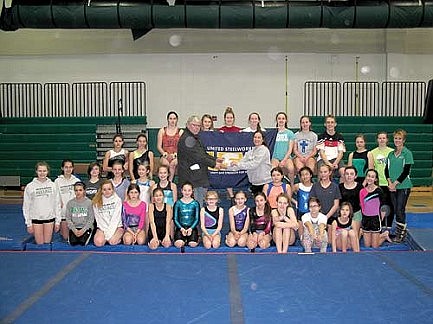 Gymnasts receive donation