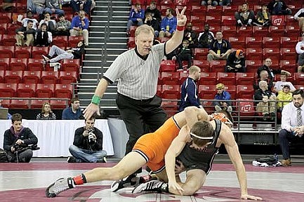 Amstadt enjoys another year as state wrestling official