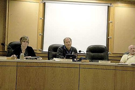 OC committee waives informality on bid specification for paving project