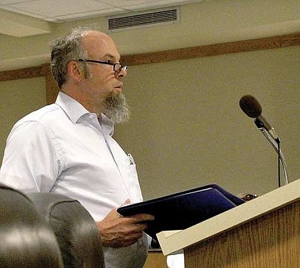 Vote on zoning ordinance postponed  after architect challenges validity of public hearing