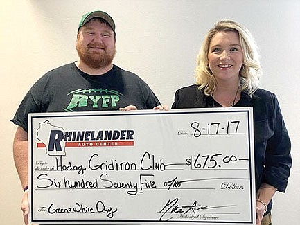 Photo: Test drives yield HGC donation 