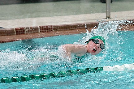JWMS swimmers host double dual