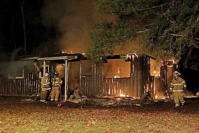 fire destroys three Lakes cabin