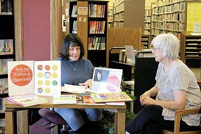 Authors impart knowledge to library patrons