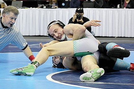 Guzik, DeMeyer on to state wrestling semis