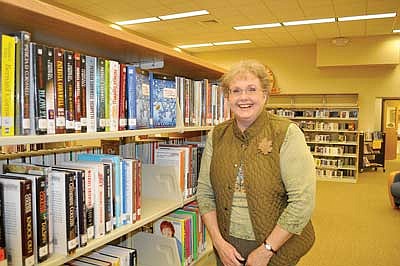 Local romance novelist to appear at library