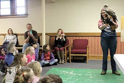 Children learn about raptors at the library