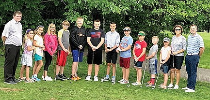 Young golfers learn about the game at camp