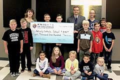 Nativity receives donation from smelt fry fundraiser