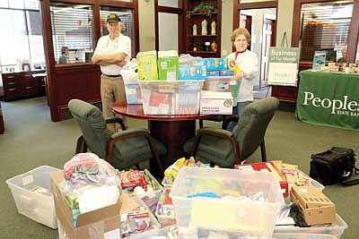Peoples State Bank collects  care package items for troops