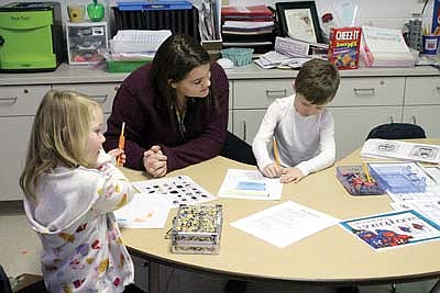 All I want for Christmas:&#8200;FBLA/DECA 'elves' help youngsters write letters to Santa