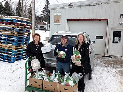 Rhinelander GM/Toyota employees donate to Rhinelander Area Food Pantry