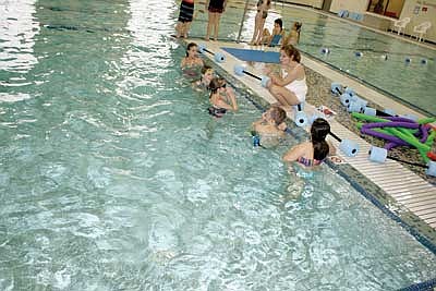 Three Lakes grads help local children learn water safety