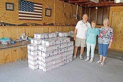 One box at a time: Trio continues  to support troops serving overseas