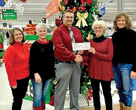 Local retailer supports Christmas Belles program