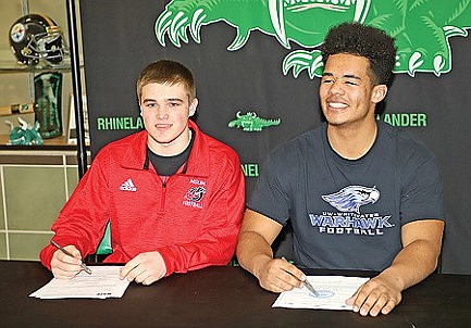 Two Hodag gridders announce college plans