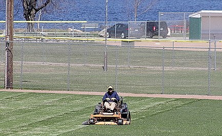 Photo: Mowing the outfield 