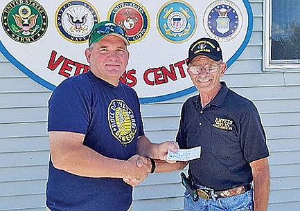 Photo: Baseball challenge nets big bucks for AMVETS 