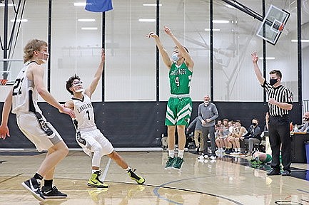 Hodag hoops holds on for two wins