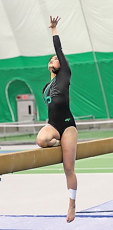 Bishop qualifies for state gymnastics