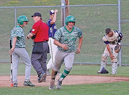 Walk-er off:&#8200;Hartman's sacrifice fly gives Rebels GNLC tourney title