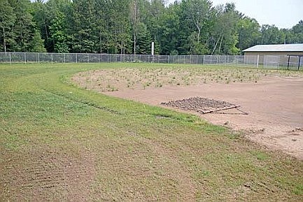 Coach speaks out on condition of new softball fields