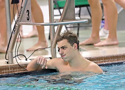 RHS swim honors Heck family, seniors in dominating win over Shawano