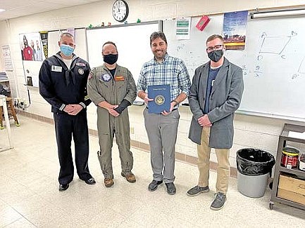 RHS math instructor receives U.S. Navy's 'Impact Influencer Award'