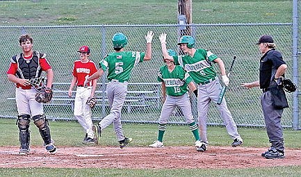 Rebels rout Medford 12-2 in rematch