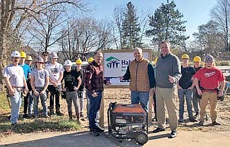 Nicolet National Bank contributes to 'Habitat' CONSTRUCTION project