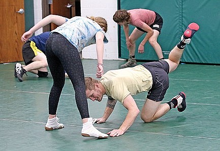Gobin named coach as girls' wrestling practice begins