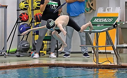 PHOTOS: Swim club hosts youth meet