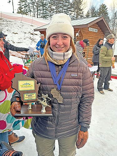 Springer sweeps way to state ski title 