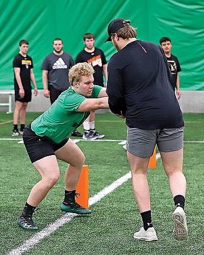 Hundreds turn out for 3rd annual football camps