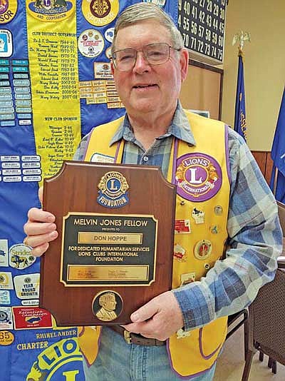 Hoppe, Theisen receive Lions Club honors